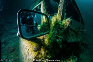 Diver in the mirror by Andrius Stanevicius 
